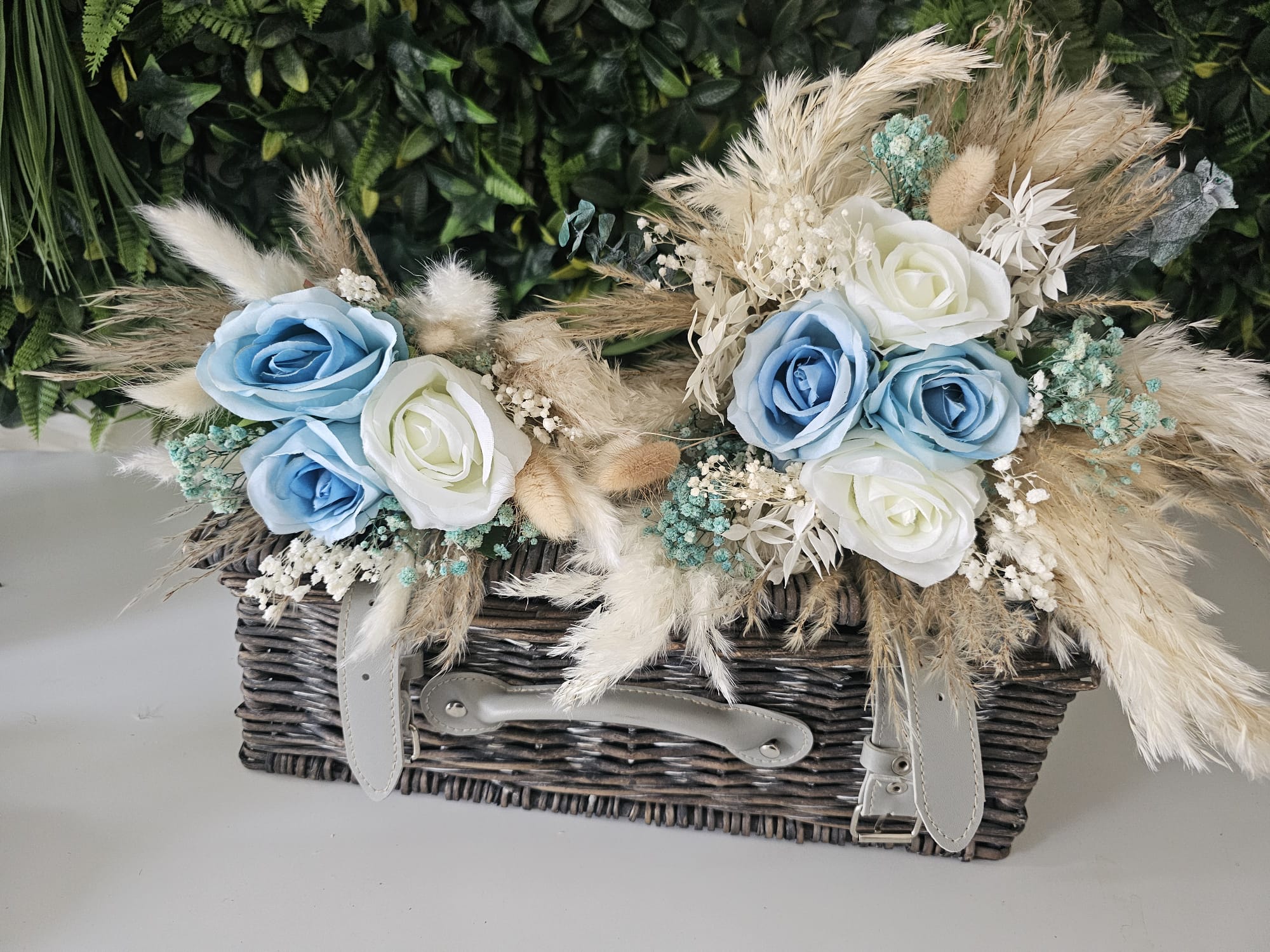 A coordinated collection of blue and neutral wedding flowers I created at Making It Bloom